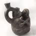 Vessel with Man and Woman Seated, Facing Each Other