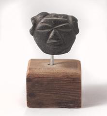 Small Face with Hole in Ears